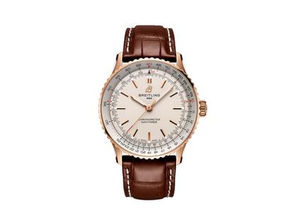 Breitling Navitimer Automatic 41 Chronometer Rotgold cremefarbenes Zifferblatt braunes Lederband – Herrenuhren Uhr ohne Datum aus 750 Rotgold. Das Gehäuse ist rund und rotgold. Das Lederarmband Kroko / Alligator ist braun. Das Zifferblatt ist ein Index in beige.