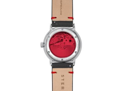 Sternglas Naos Edition Bauhaus X Rot Automatik Edelstahl 38mm beiges Zifferblatt schwarzes Lederband – Herrenuhren Uhr mit Datum aus Edelstahl. Das Gehäuse ist rund und silber. Das Lederarmband ist schwarz. Das Zifferblatt ist ein Index in beige. – Ansicht 5