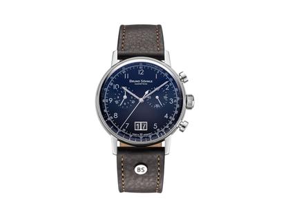 Bruno Söhnle Glashütte Bergamo Chronograph Quarz Edelstahl 38,5mm blaues Zifferblatt braunes Lederband – Herrenuhren Chronograph aus Edelstahl. Das Gehäuse ist rund und silber. Das Lederarmband ist braun. Das Zifferblatt ist arabisch Index und blau.