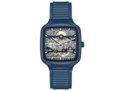 Rado True Square Automatik Skeleton Keramik 38mm blaues Zifferblatt blaues Kautschukband – Herrenuhren Uhr ohne Datum aus Keramik und Titan. Das Gehäuse ist quadratisch und blau. Das Kautschuk / Kunststoff / Silikon Armband ist blau. Das Zifferblatt ist skelettiert und blau.