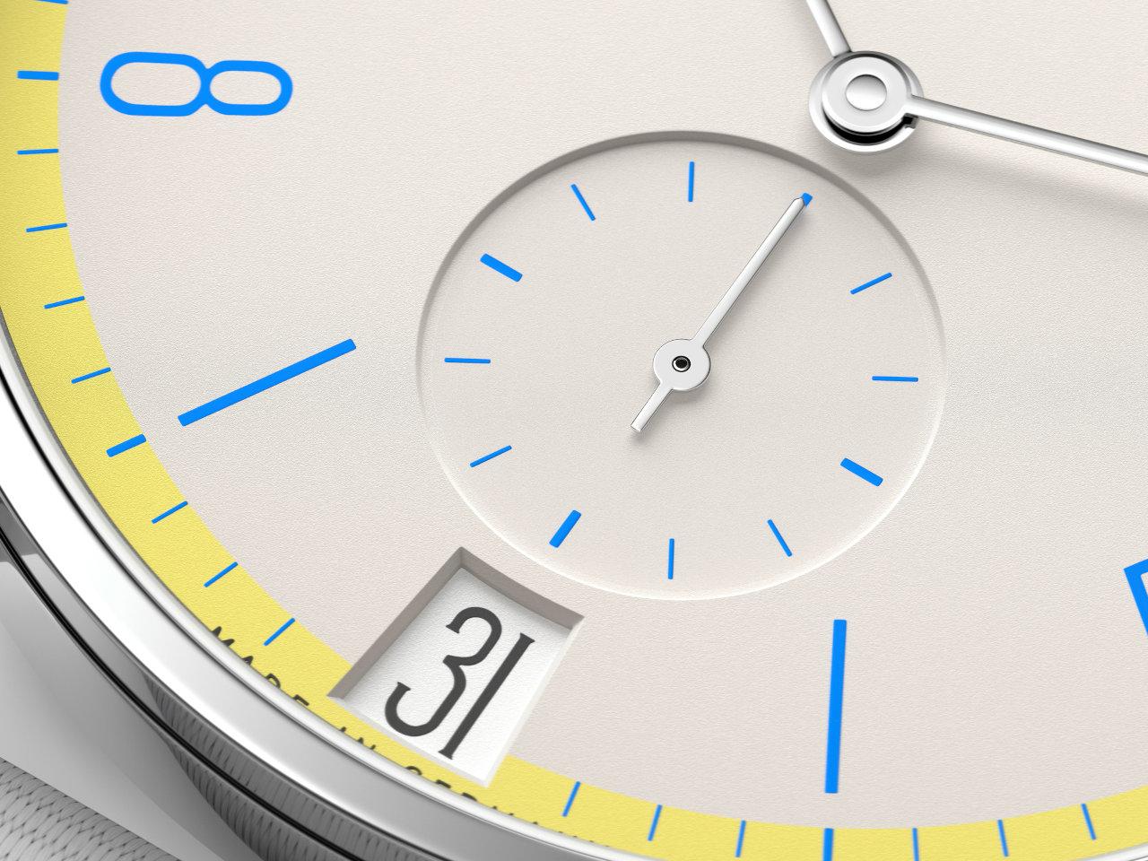 Nomos Glashütte Tangente 38 Datum "175 Years Watchmaking - Lemonbiscuit" Handaufzug Edelstahl cremeweißes Zifferblatt graues Textilband Glasboden – Herrenuhren Uhr mit Datum aus Edelstahl. Das Gehäuse ist rund und silber. Das Textilarmband ist grau. Das Zifferblatt ist arabisch Index und beige. – Ansicht 5