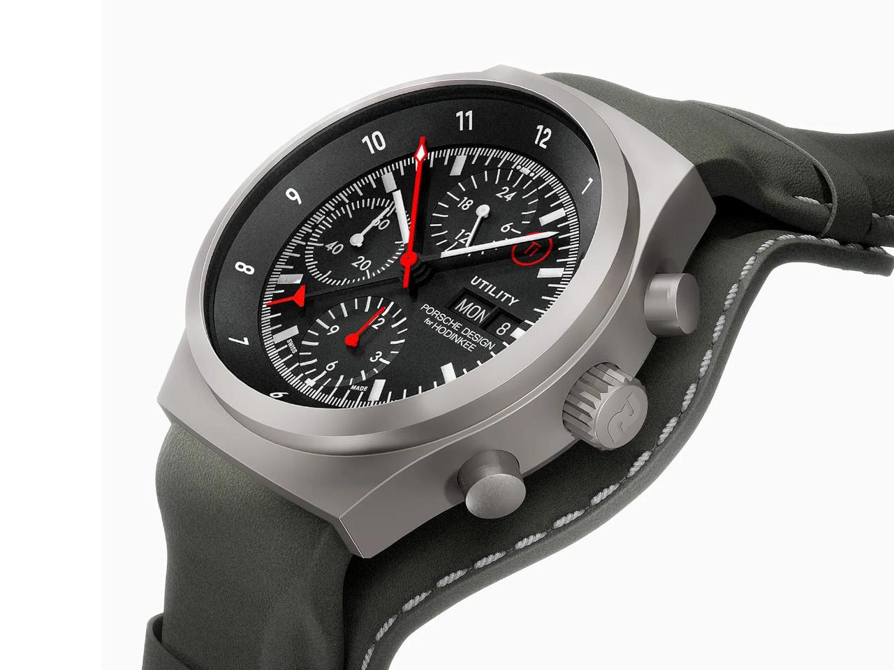 Porsche Design Chronograph 1 - Utility Hodinkee 2026 Limited Edition Automatik Titan 41mm schwarzes Zifferblatt Titanband und Lederband – Herrenuhren Chronograph aus Leder, Titan und Titancarbid beschichtet. Das Gehäuse ist rund und grau. Das Titanarmband ist grau. Das Zifferblatt ist ein Index in schwarz. – Ansicht 3