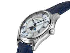 Frederique Constant Classics Elegance Luna Automatik Edelstahl 36mm weißes Zifferblatt blaues Lederband – Damenuhren Uhr ohne Datum aus Edelstahl und Leder. Das Gehäuse ist rund und silber. Das Lederarmband ist blau. Das Zifferblatt ist römisch und weiß. – Ansicht 2