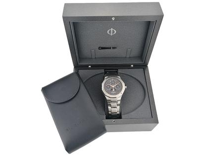 Juwelier Roller Baume & Mercier Riviera Ewiger Kalender Limited Edition Automatik Edelstahl 40mm graues Zifferblatt Metallband M0A10786 Full Set mit Garantie Occasion Neu – Herrenuhren Uhr mit Kalender aus Edelstahl. Das Gehäuse ist sonstige Form und silber. Das Edelstahlarmband ist silber. Das Zifferblatt ist römisch Index und grau. – Ansicht 6
