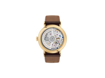 Nomos Glashütte Tangente Gold Neomatik Automatik Gelbgold 35mm weißes Zifferblatt schwarzes Lederband – Damenuhren Uhr ohne Datum aus 750 Gelbgold und Leder. Das Gehäuse ist rund und gelbgold. Das Lederarmband ist schwarz. Das Zifferblatt ist arabisch Index und weiß. – Ansicht 2