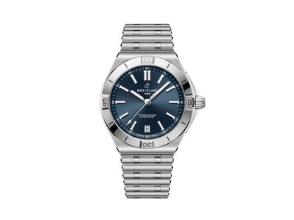 Breitling Chronomat B31 Automatik 40 Edelstahl blaues Zifferblatt Metallband – Herrenuhren Uhr mit Datum aus Edelstahl. Das Gehäuse ist rund und silber. Das Edelstahlarmband ist silber. Das Zifferblatt ist ein Index in blau.