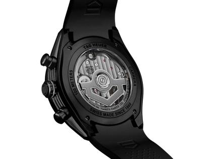 TAG Heuer Carrera Chronograph Extreme Sport Automatik Titan Schwarz-DLC 44mm skelettiertes Zifferblatt schwarzes Kautschukband – Herrenuhren Chronograph aus DLC beschichtet und Titan. Das Gehäuse ist rund und schwarz. Das Kautschuk / Kunststoff / Silikon Armband ist schwarz. Das Zifferblatt ist ein Index in schwarz. – Ansicht 2