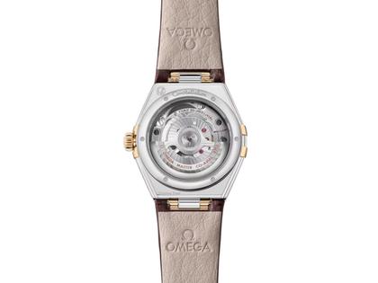 Omega Constellation Automatik Edelstahl 29mm goldenes Zifferblatt mit Brillanten braunes Lederband – Damenuhren Uhr mit Datum aus 750 Gelbgold, Edelstahl und Leder. Das Gehäuse ist rund und silber-gelbgold. Das Lederarmband Kroko / Alligator ist braun. Das Zifferblatt ist ein Index in gelbgold. – Ansicht 2