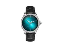 H. Moser & Cie. Endeavour Centre Seconds Diamonds Purity Blue Lagoon Automatic Edelstahl 38mm blaues Zifferblatt schwarzes Lederband – Damenuhren Uhr ohne Datum aus Edelstahl. Das Gehäuse ist rund und silber. Das Lederarmband Kroko / Alligator ist braun. Das Zifferblatt ist ein Index in blau.
