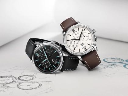 Glashütte Original Senator Chronograph Panoramadatum Automatik Edelstahl 42mm schwarzes Zifferblatt graues Textilband – Herrenuhren Chronograph aus Edelstahl. Das Gehäuse ist rund und silber. Das Textilarmband ist grau. Das Zifferblatt ist römisch Index und schwarz. – Ansicht 3