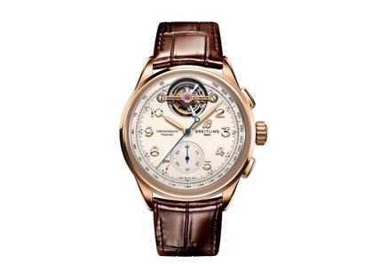 Breitling Premier B21 Chronograph Tourbillon 42 Léon Breitling Automatik Rotgold beiges Zifferblatt braunes Lederband – Herrenuhren Chronograph aus 750 Rotgold und Leder. Das Gehäuse ist rund und roségold. Das Lederarmband Kroko / Alligator ist braun. Das Zifferblatt ist arabisch und beige.