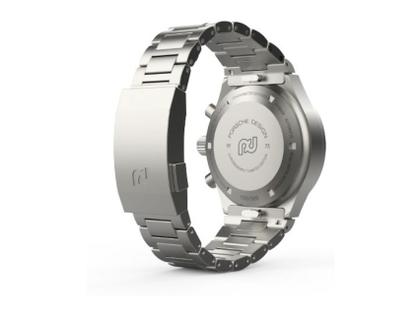 Porsche Design Chronograph 1 - 1975 Limited Edition – Herrenuhren Chronograph aus Titan. Das Gehäuse ist rund und silber. Das Textilarmband ist weiß. Das Zifferblatt ist ein Index in schwarz. – Ansicht 6