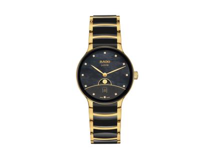 Damenuhren Uhr mit Datum aus Edelstahl, Keramik und PVD beschichtet. Das Gehäuse ist rund und gelbgold. Das Edelstahlarmband ist gelbgold. Das Zifferblatt ist ein Index in schwarz.