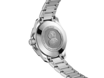 TAG Heuer Aquaracer Professional 300 Date Automatik Edelstahl 36mm pastellgrünes Zifferblatt mit Brillanten Metallband – Damenuhren Uhr mit Datum aus Edelstahl und Keramik. Das Gehäuse ist rund und silber. Das Edelstahlarmband ist silber. Das Zifferblatt ist ein Index in grün. – Ansicht 2