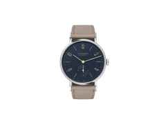 Nomos Glashütte Tangente 35 Nachtblau Handaufzug Edelstahl 35mm blaues Zifferblatt beiges Lederband Glasboden – Damenuhren Uhr ohne Datum aus Edelstahl und Leder. Das Gehäuse ist rund und silber. Das Lederarmband ist beige. Das Zifferblatt ist arabisch Index und blau.