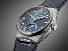 Frederique Constant Highlife Moonphase Date Manufacture Automatik Edelstahl 39mm blaues Zifferblatt Metallband und blaues Lederband – Herrenuhren Uhr mit Datum aus Edelstahl und Leder. Das Gehäuse ist rund und silber. Das Edelstahlarmband ist silber. Das Zifferblatt ist ein Index in blau. – Ansicht 7