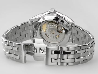 Hamilton Jazzmaster Open Heart Lady Automatik Edelstahl 36mm apricotfarbenes Zifferblatt Metalband – Damenuhren Uhr ohne Datum aus Edelstahl. Das Gehäuse ist rund und silber. Das Edelstahlarmband ist silber. Das Zifferblatt ist ein Index in orange. – Ansicht 4