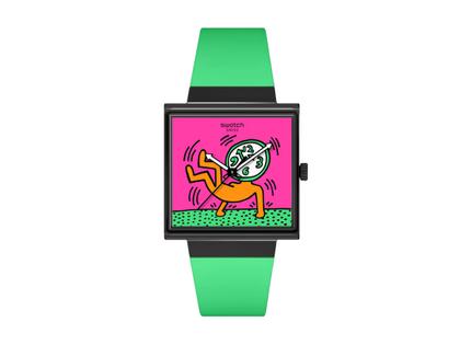 Swatch Originals Breaks Off Quarz Kunststoff 42mm pinkes Zifferblatt grünes Silikonband – Herrenuhren Uhr ohne Datum aus Bio-Kunststoff und Kunststoff. Das Gehäuse ist quadratisch und schwarz. Das Kautschuk / Kunststoff / Silikon Armband ist grün. Das Zifferblatt ist ohne Zeichen und pink.