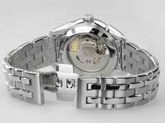 Hamilton Jazzmaster Open Heart Lady Automatik Edelstahl 36mm apricotfarbenes Zifferblatt Metalband – Damenuhren Uhr ohne Datum aus Edelstahl. Das Gehäuse ist rund und silber. Das Edelstahlarmband ist silber. Das Zifferblatt ist ein Index in orange. – Ansicht 4