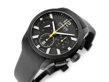 Union Glashütte Belisar Chronograph Sport Automatik Edelstahl PVD-Schwarz 43mm schwarzes Zifferblatt schwarzes Kautschukband D002.627.16.207.00 Full Set Occasion Refurbished – Herrenuhren Chronograph aus Carbon, Edelstahl und PVD beschichtet. Das Gehäuse ist rund und schwarz. Das Kautschuk / Kunststoff / Silikon Armband ist schwarz. Das Zifferblatt ist arabisch Index und schwarz. – Ansicht 4