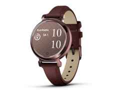 Garmin Lily 2 Smartwatch Aluminium eloxiert 35mm dunkelbronzefarbenes Display bordeauxfarbenes Lederband – Damenuhren Uhr Multifunktion aus eloxiertes Aluminium, Kunststoff und Leder. Das Gehäuse ist rund und rot. Das Lederarmband ist rot. Das Zifferblatt ist digital und rot.