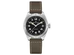 Hamilton Khaki Field Expedition Automatik Edelstahl 41mm schwarzes Zifferblatt olivgrünes Lederband – Herrenuhren Uhr ohne Datum aus Edelstahl und Leder. Das Gehäuse ist rund und silber. Das Lederarmband ist grün. Das Zifferblatt ist arabisch und schwarz.
