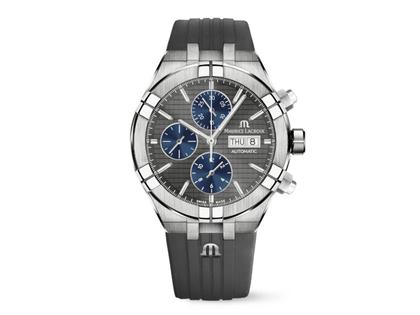 Maurice Lacroix Aikon Chronograph Automatik Titan 44mm graues Zifferblatt graues Kautschukband – Herrenuhren Chronograph aus Kautschuk und Titan. Das Gehäuse ist rund und silber. Das Kautschuk / Kunststoff / Silikon Armband ist grau. Das Zifferblatt ist ein Index in grau.