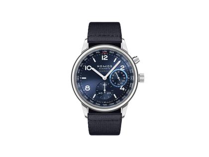 Herrenuhren Uhr ohne Datum aus Edelstahl. Das Gehäuse ist rund und silber. Das Textilarmband ist blau. Das Zifferblatt ist arabisch Index und blau.