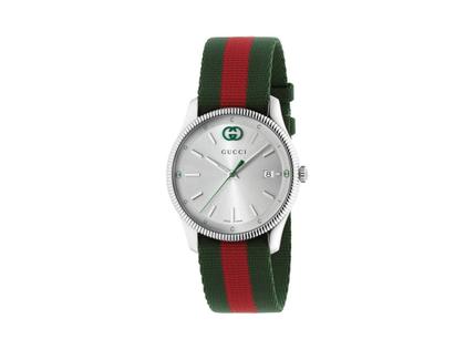 Damenuhren Uhr mit Datum aus Edelstahl. Das Gehäuse ist rund und silber. Das Textilarmband ist grün. Das Zifferblatt ist ein Index in silber.