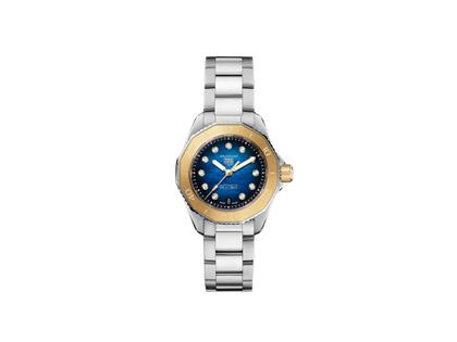 TAG Heuer Aquaracer Professional 200 Date Automatik Edelstahl 30mm blaues  Perlmutt-Zifferblatt mit Brillanten Metallband – Damenuhren Uhr mit Datum aus 750 Gelbgold und Edelstahl. Das Gehäuse ist rund und silber. Das Edelstahlarmband ist silber. Das Zifferblatt ist ein Index in blau.