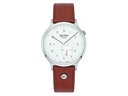 Bruno Söhnle Glashütte Brunello I Quarz Edelstahl cremefarbenes Zifferblatt cognac Lederband – Herrenuhren Uhr mit Datum aus Edelstahl. Das Gehäuse ist rund und silber. Das Lederarmband ist braun. Das Zifferblatt ist arabisch Index und beige.