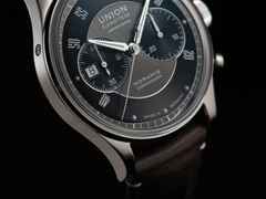 Union Glashütte Noramis Chronograph Sachsen Classic 2022 Limited Edition Automatik Edelstahl 42mm graues Zifferblatt braunes Lederband – Herrenuhren Chronograph aus Edelstahl. Das Gehäuse ist rund und silber. Das Lederarmband ist braun. Das Zifferblatt ist arabisch Index und grau. – Ansicht 5
