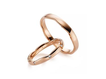 Gerstner Exclusiv-Kollektion Trauring Paar aus 585/- Mittelgold mit Brillanten 0,035ct – Ringe Trauring mit Besatz in roségold und aus 585 Gelbgold.