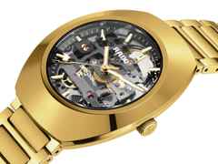 Rado DiaStar Original Skeleton Automatik Edelstahl Gelbgold-PVD 38mm skelettiertes Zifferblatt Metallband – Damenuhren Uhr ohne Datum aus Edelstahl und PVD beschichtet. Das Gehäuse ist oval und gelbgold. Das Edelstahlarmband ist gelbgold. Das Zifferblatt ist ein Index in grau. – Ansicht 2