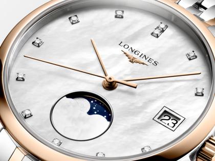Longines Elegant Collection Quarz Edelstahl 30mm weißes Perlmutt-Zifferblatt zweifarbiges Metallband – Damenuhren Uhr mit Datum aus 750 Gelbgold, Edelstahl und vergoldet. Das Gehäuse ist rund und silber. Das Edelstahlarmband mit Gold ist silber-roségold. Das Zifferblatt ist ein Index in weiß. – Ansicht 4