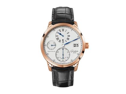 Glashütte Original Senator Chronometer Regulator Handaufzug Rotgold 42mm silbernes Zifferblatt schwarzes Lederband – Herrenuhren Uhr ohne Datum aus 750 Rotgold. Das Gehäuse ist rund und roségold. Das Lederarmband Kroko / Alligator ist schwarz. Das Zifferblatt ist römisch und silber.