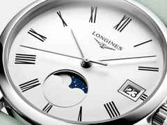 Longines Elegant Collection Quarz Edelstahl 30mm weißes Zifferblatt grünes Lederband – Damenuhren Uhr mit Datum aus Edelstahl und Leder. Das Gehäuse ist rund und silber. Das Lederarmband ist grün. Das Zifferblatt ist römisch und weiß. – Ansicht 4