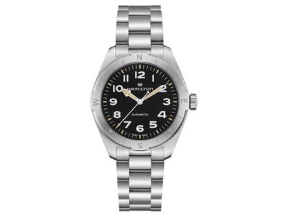 Hamilton Khaki Field Expedition Automatik Edelstahl 41mm schwarzes Zifferblatt Metallband – Herrenuhren Uhr ohne Datum aus Edelstahl. Das Gehäuse ist rund und silber. Das Edelstahlarmband ist silber. Das Zifferblatt ist arabisch und schwarz.