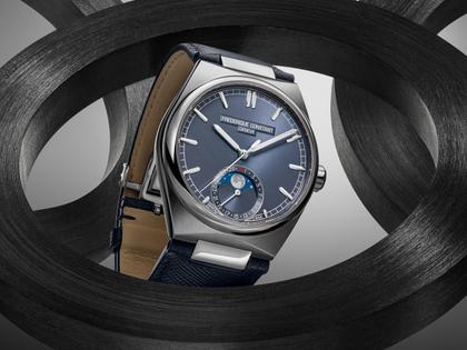 Frederique Constant Highlife Moonphase Date Manufacture Automatik Edelstahl 39mm blaues Zifferblatt Metallband und blaues Lederband – Herrenuhren Uhr mit Datum aus Edelstahl und Leder. Das Gehäuse ist rund und silber. Das Edelstahlarmband ist silber. Das Zifferblatt ist ein Index in blau. – Ansicht 8