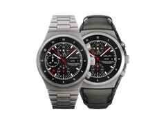 Porsche Design Chronograph 1 - Utility Hodinkee 2026 Limited Edition Automatik Titan 41mm schwarzes Zifferblatt Titanband und Lederband – Herrenuhren Chronograph aus Leder, Titan und Titancarbid beschichtet. Das Gehäuse ist rund und grau. Das Titanarmband ist grau. Das Zifferblatt ist ein Index in schwarz.