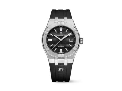 Maurice Lacroix Aikon Automatik Edelstahl 39mm schwarzes Zifferblatt schwarzes Kautschukband – Herrenuhren Uhr mit Datum aus Edelstahl und Kautschuk. Das Gehäuse ist rund und silber. Das Kautschuk / Kunststoff / Silikon Armband ist schwarz. Das Zifferblatt ist ein Index in schwarz.