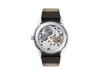 Nomos Glashütte Orion 33 1989 Handaufzug Edelstahl 33mm graues Zifferblatt schwarzes Lederband Glasboden – Damenuhren Uhr ohne Datum aus Edelstahl und Leder. Das Gehäuse ist rund und silber. Das Lederarmband ist anthrazit. Das Zifferblatt ist ein Index in anthrazit. – Ansicht 2