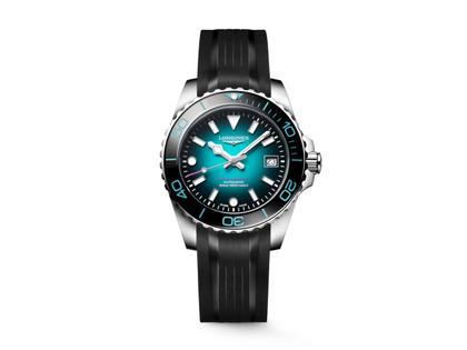 Longines HydroConquest 2026 Commonwealth Games Automatik Edelstahl 39mm türkises Zifferblatt schwarzes Kautschukband – Herrenuhren Uhr mit Datum aus Edelstahl, Kautschuk und Keramik. Das Gehäuse ist rund und silber. Das Kautschuk / Kunststoff / Silikon Armband ist schwarz. Das Zifferblatt ist ein Index in schwarz.