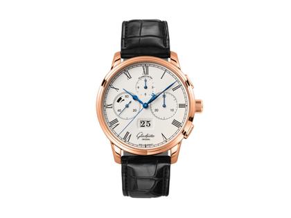 Herrenuhren Chronograph aus 750 Rotgold. Das Gehäuse ist rund und roségold. Das Lederarmband Kroko / Alligator ist schwarz. Das Zifferblatt ist römisch und weiß.