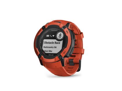 Garmin Instinct 2X Solar faserverstärktes Polymer rot 50 mm Kautschukband rot – Damenuhren Uhr Multifunktion aus Kautschuk und Kunststoff. Das Gehäuse ist rund und rot. Das Kautschuk / Kunststoff / Silikon Armband ist rot. Das Zifferblatt ist digital und schwarz. – Ansicht 2