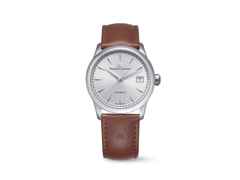 Maurice Lacroix 1975 Automatik Edelstahl 36mm silberfarbenes Zifferblatt braunes Lederband – Herrenuhren Uhr mit Datum aus Edelstahl. Das Gehäuse ist rund und silber. Das Lederarmband ist braun. Das Zifferblatt ist ein Index in silber.