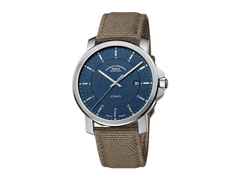 Mühle Glashütte 29er Casual Automatik Edelstahl 42,4mm blaues Zifferblatt beiges Canvasband – Herrenuhren Uhr mit Datum aus Edelstahl und Leder. Das Gehäuse ist rund und silber. Das Textilarmband ist grau. Das Zifferblatt ist ein Index in blau.