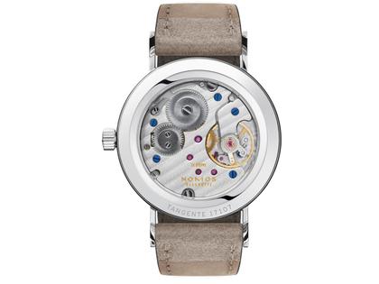 Nomos Glashütte Tangente 33 Duo Handaufzug Edelstahl 33mm weißes Zifferblatt beiges Lederband Glasboden – Damenuhren Uhr ohne Datum aus Edelstahl. Das Gehäuse ist rund und silber. Das Lederarmband ist beige. Das Zifferblatt ist arabisch Index und weiß. – Ansicht 2