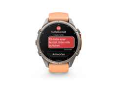 Garmin Fenix 9 Pro inReach Titan 43mm digitales Display orangefarbenes Silikonband – Herrenuhren Uhr Multifunktion aus Kautschuk und Titan. Das Gehäuse ist rund und grau. Das Kautschuk / Kunststoff / Silikon Armband ist orange. Das Zifferblatt ist digital und schwarz.