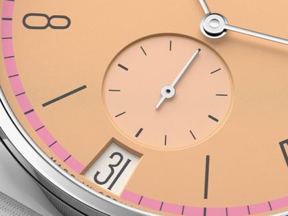 Nomos Glashütte Tangente 38 Datum "175 Years Watchmaking - Pastell" Handaufzug Edelstahl korallfarbenes Zifferblatt graues Textilband Glasboden – Herrenuhren Uhr mit Datum aus Edelstahl. Das Gehäuse ist rund und silber. Das Textilarmband ist grau. Das Zifferblatt ist arabisch Index und orange. – Ansicht 6